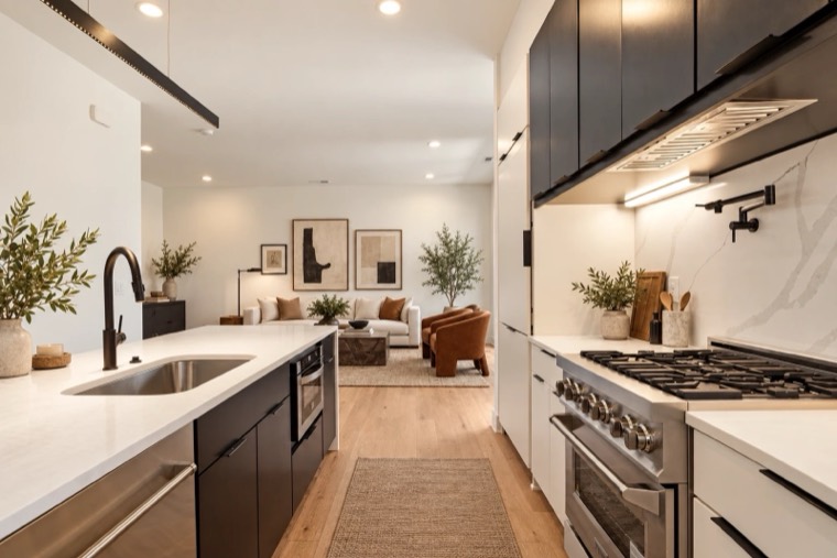 Kitchen with dark lower cabinets