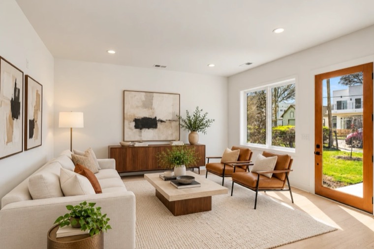 Living room with white walls and wood floors